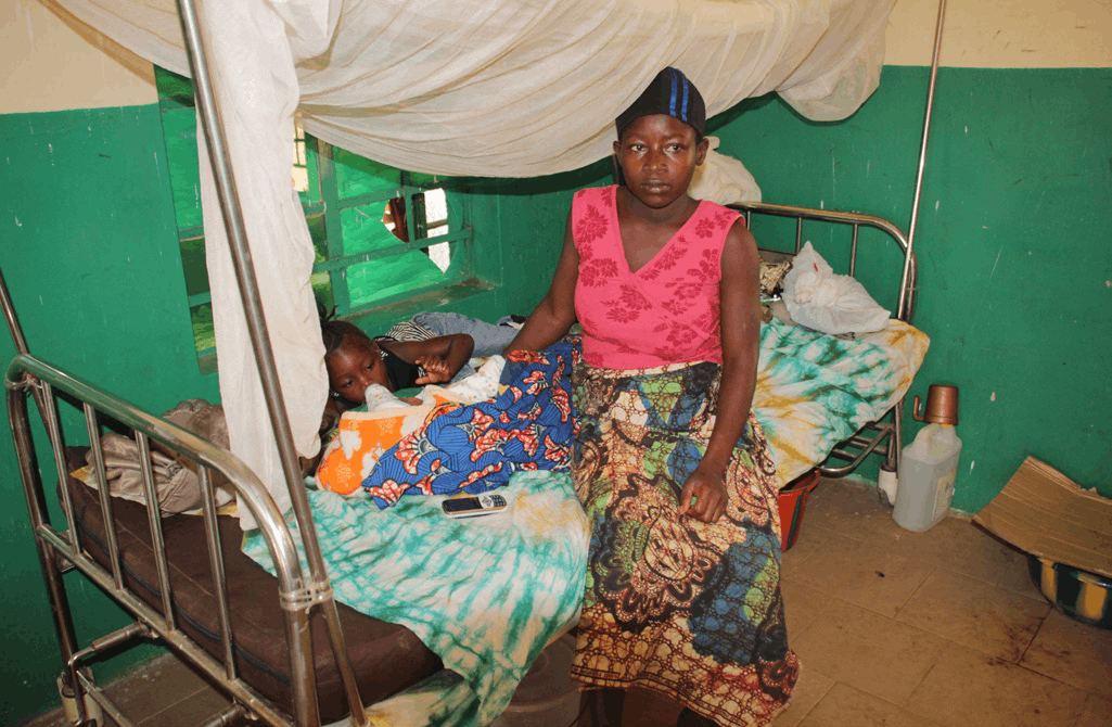 Woman at health clinic - Bread and Water for Africa health care programs