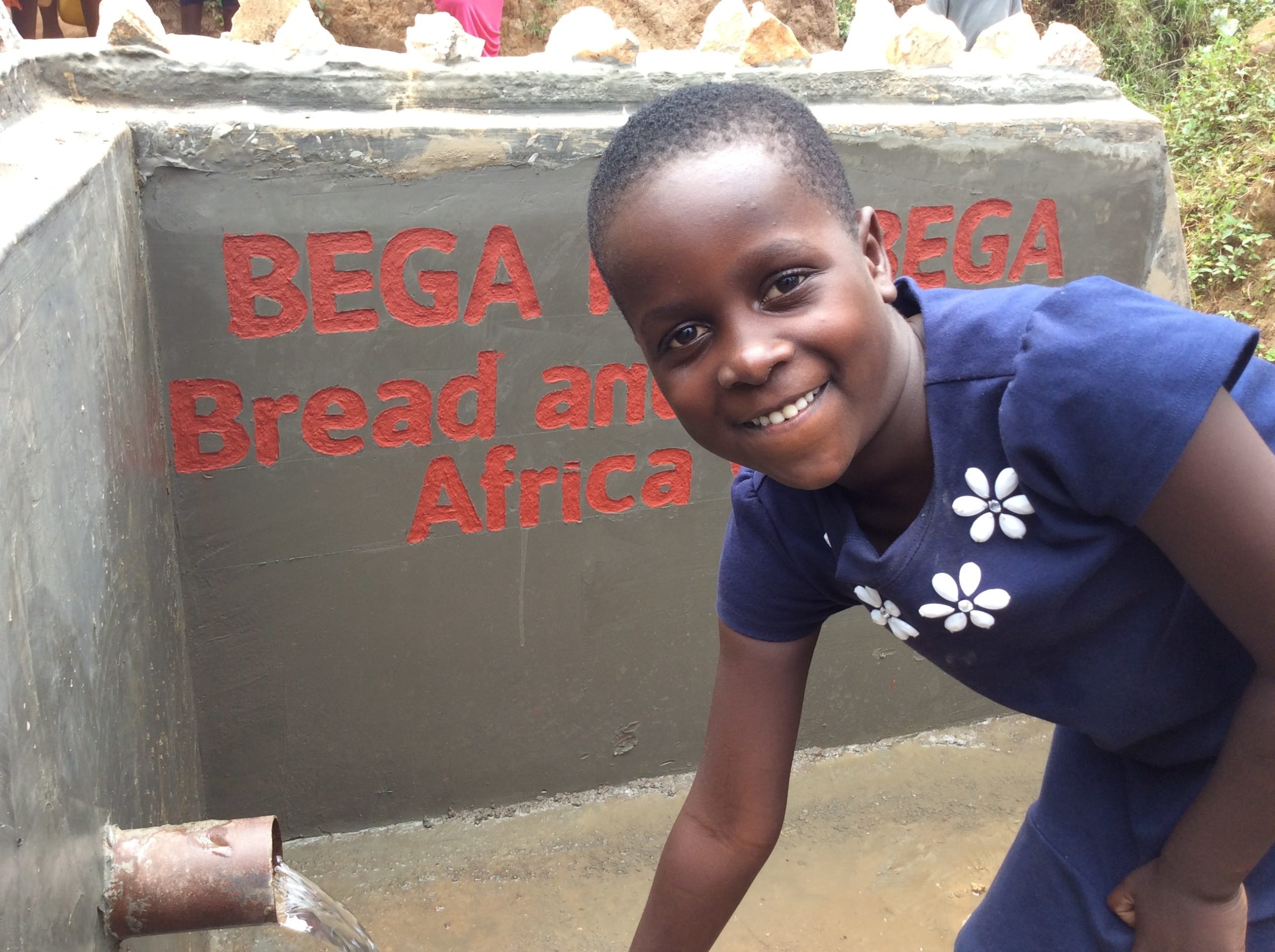 BWA -- BkB Spring Protection Child happily fetching water