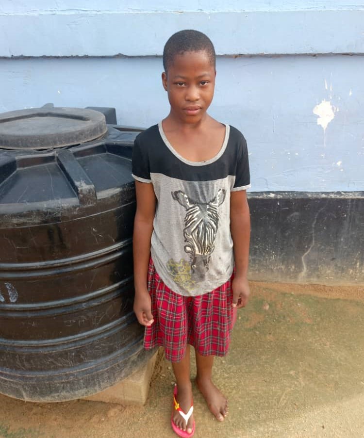 Rehema, a 9-year-old girl at the Watoto Wa Africa Orphanage, who is now healthy and thriving thanks to proper nutrition.